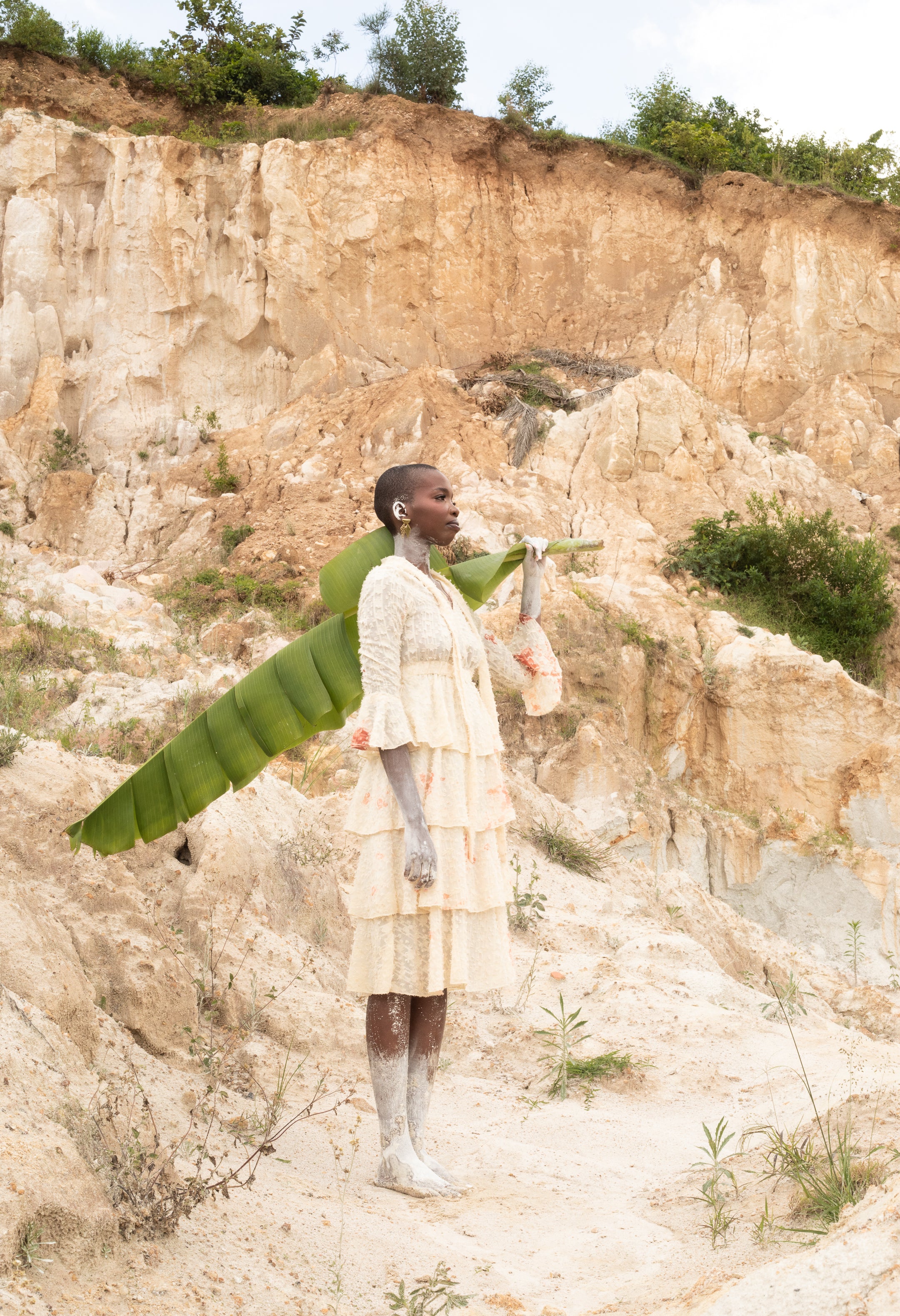 A model wearing a Zvet gold plated earrings