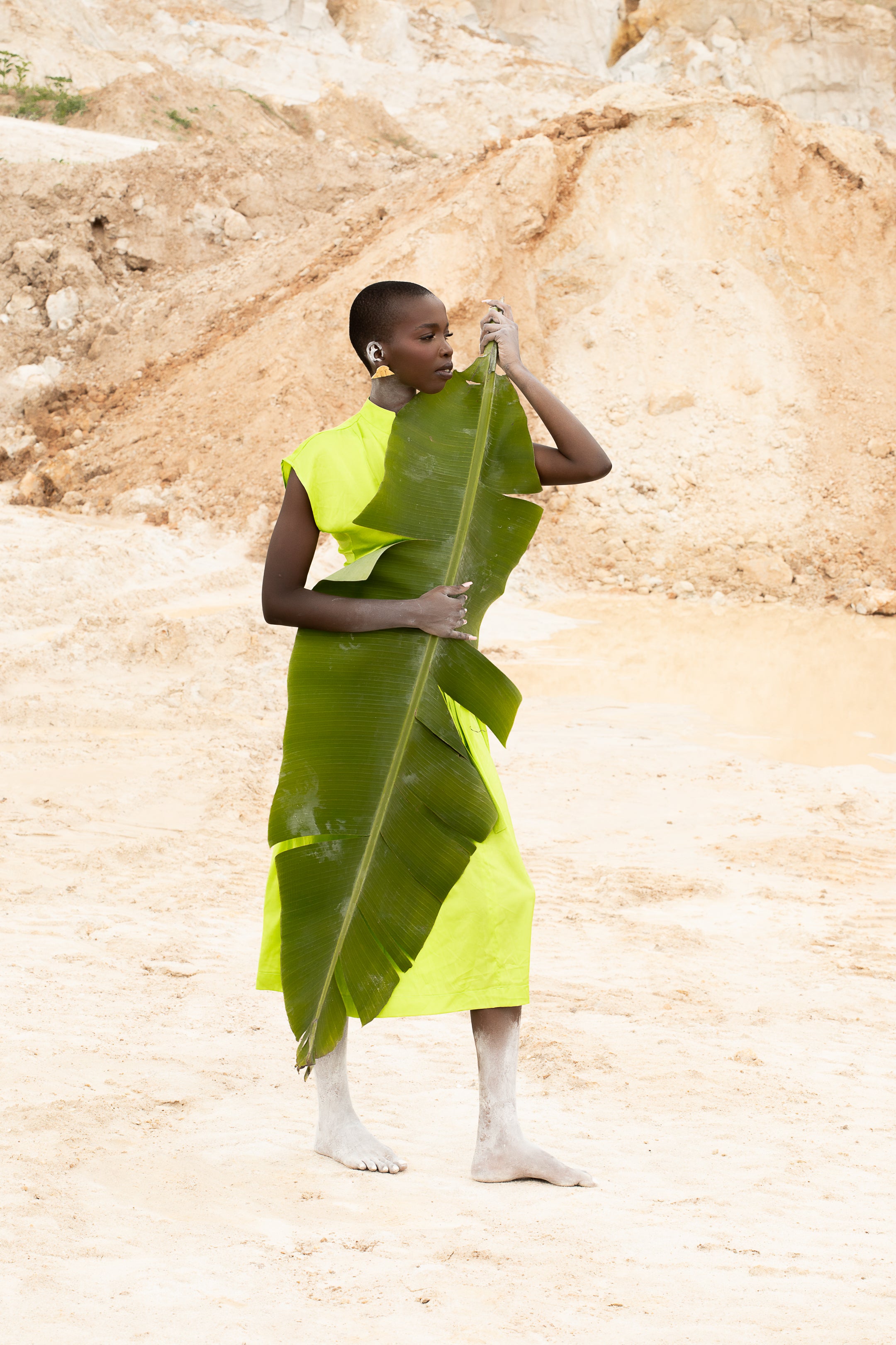A model wearing a Zvet gold plated earrings