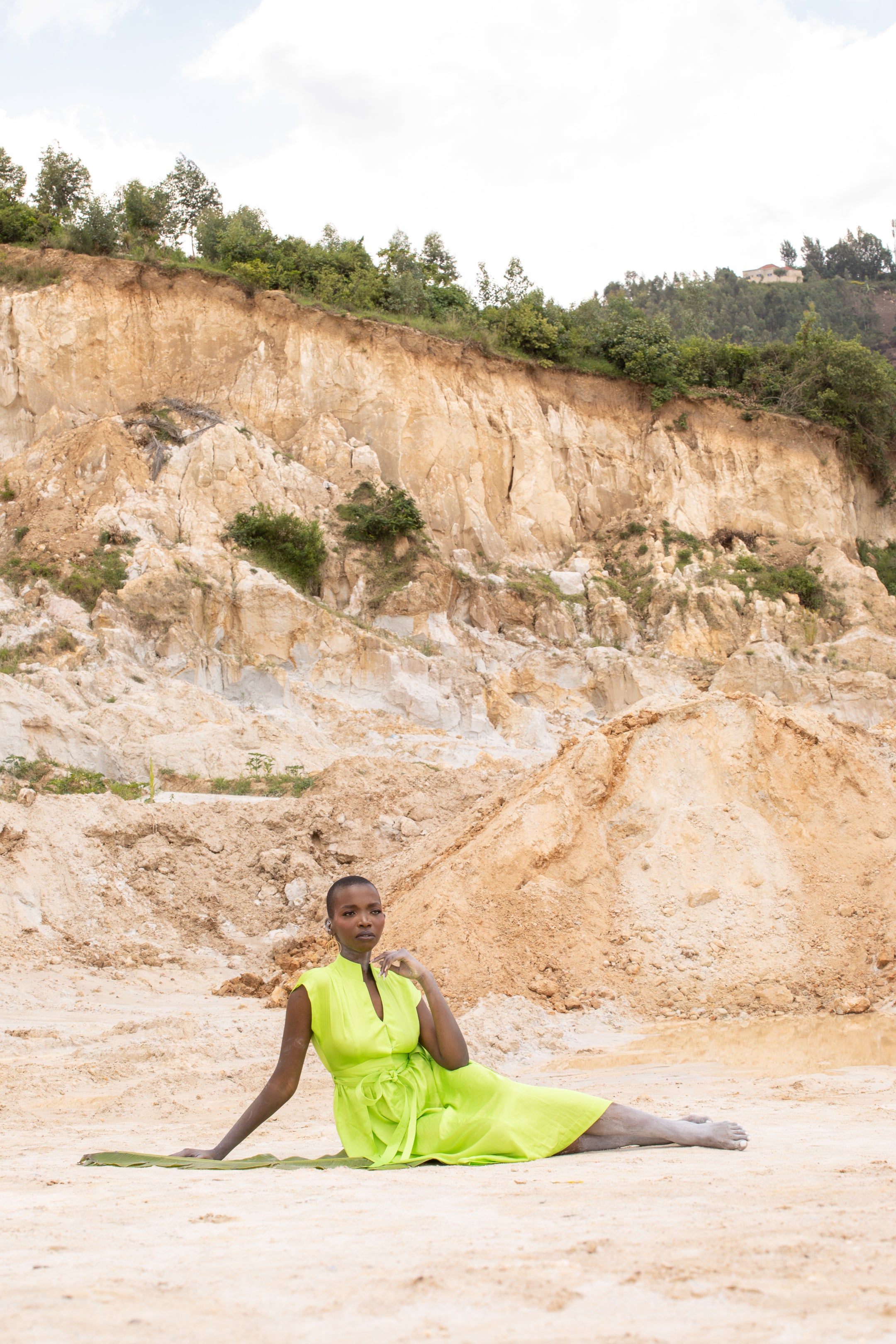 A model wearing a Zvet gold plated earrings